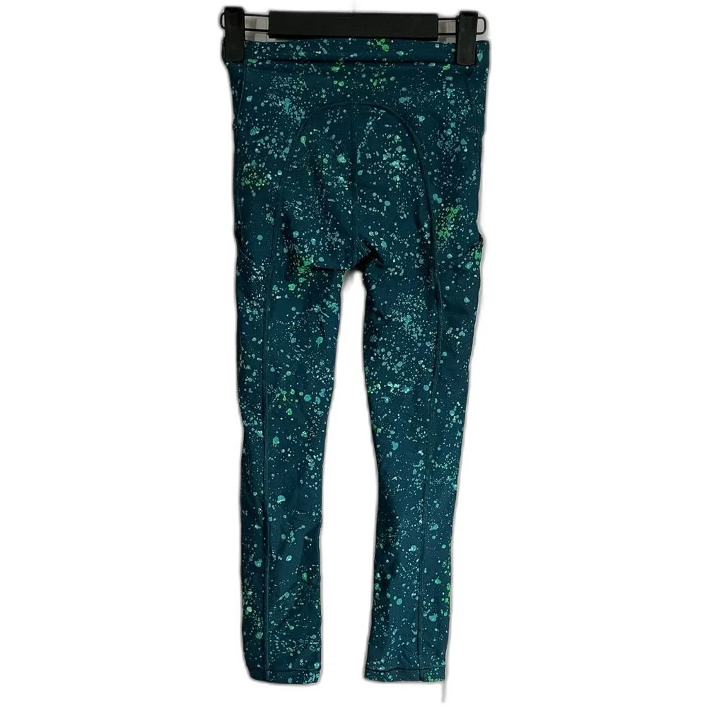 Athleta Ultimate Stash Pocket Splatter Capri Oceanic Teal Size XXS